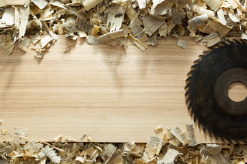 Carpenter tools on wooden table with sawdust. Carpenter workplace top view