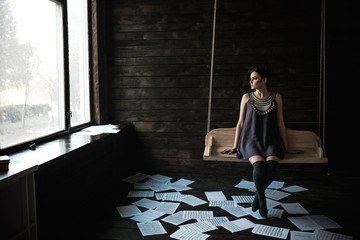 girl posing in a dark room