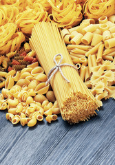 Mix of pasta on wood