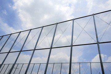 Fototapeta na wymiar iron fence with sky background