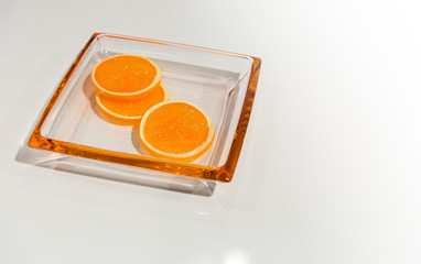 Pieces of orange on the plate