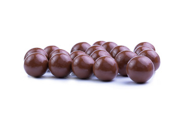 Chocolate candies on a white background.