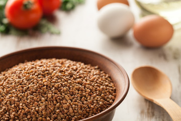 Ceramic bowl with buckwheat.