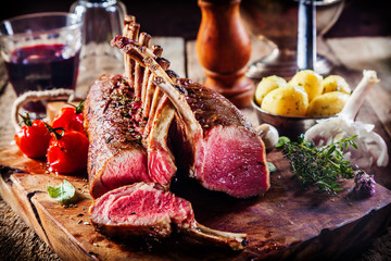 Rectangle Rack of Lamb with Herbs and Ingredients © exclusive-design