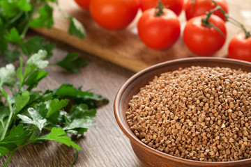 Ceramic bowl with buckwheat.