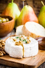 Camembert cheese with walnuts,  honey and thyme