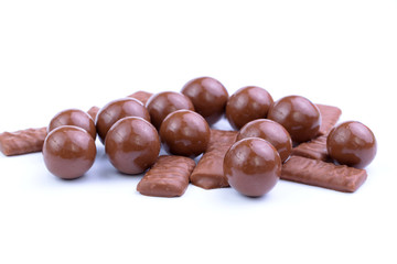 Chocolate candies on a white background.
