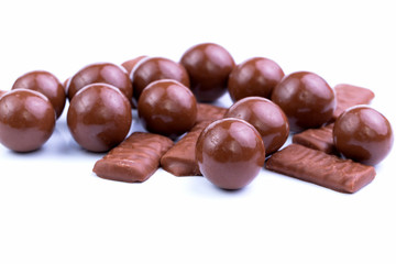 Chocolate candies on a white background.
