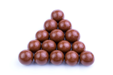 Chocolate candies on a white background.
