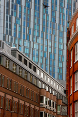 Fototapeta premium Windows set in steel on modern buildings