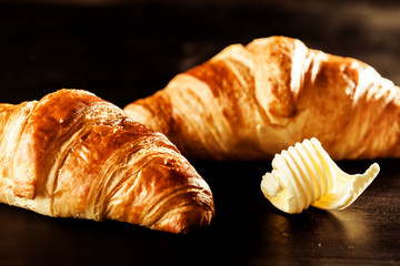 Butter and Croissant Bread on Top of a Table