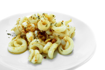 Fried squid with garlic and rosemary mixture.