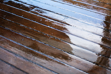 wet deck planks on a sailing yacht