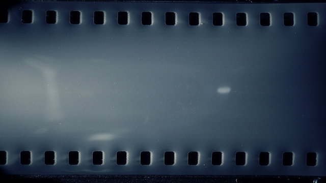 35mm camera inside, film, is rewound on each shot.