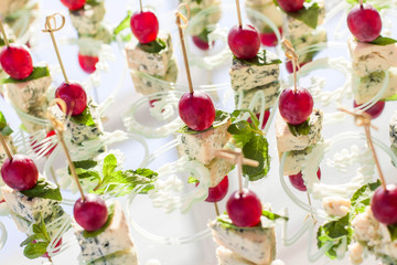 Canapes with cheese and grapes
