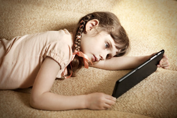 Little Girl with Tablet