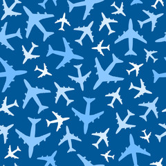 Seamless background pattern of airplanes in the sky. Vector.