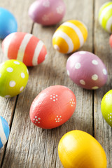 Fototapeta na wymiar Easter eggs on grey wooden background