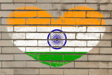 heart shape flag of india on brick wall