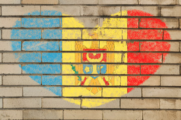 heart shape flag of moldova on brick wall