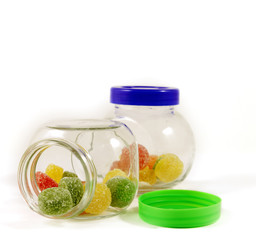 Two glass jars with colorful candy