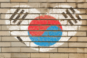 heart shape flag of South Korea on brick wall