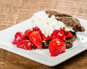 Fresh strawberry dessert with chocolate cookie