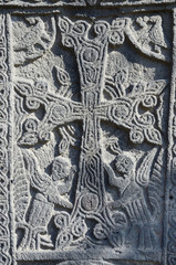 Fototapeta na wymiar Stone carving,christian cross with mythical creatures,Armenia