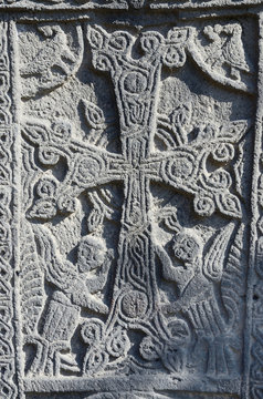 Stone carving,christian cross with mythical creatures,Armenia