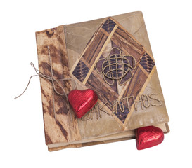 beige book and red heart