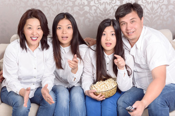 Family home at TV watching films