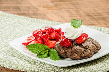 Fresh strawberry dessert with chocolate cookie