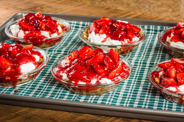 Strawberry pies on baking sheet