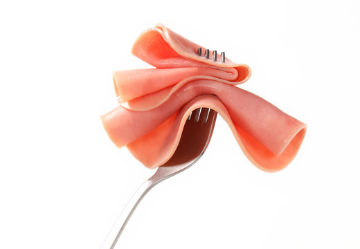 Slice of ham on fork