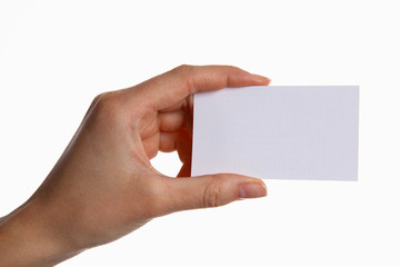 Female hand holding a blank business card