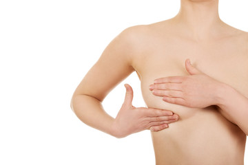 Fototapeta premium Woman examining breast.