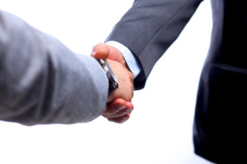 Fototapeta premium Closeup of a business handshake, on white background
