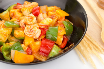 Sauted mixed vegetables and shrimp with tomato sauce