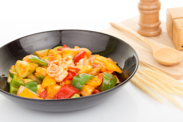 Sauted mixed vegetables and shrimp with tomato sauce