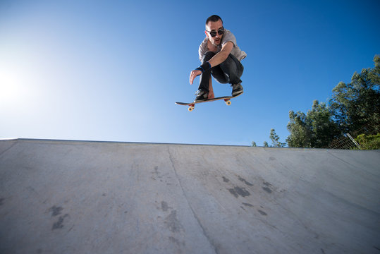 Skateboarder flying