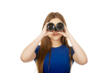 Young woman with binoculars.