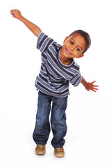 Black kid in jeans and shirt © Fxquadro
