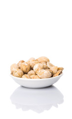 Candlenuts over white background