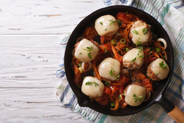 meatballs with cheese in the pan. horizontal top view
