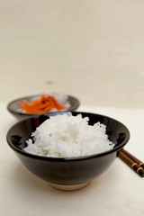Close up rice in a black bowl 