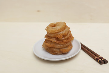 Golden onion ring with space on background