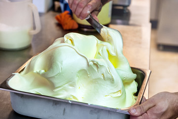 Man making a fresh batch of vanilla ice cream