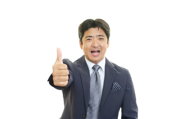 ガッツポーズのビジネスマン