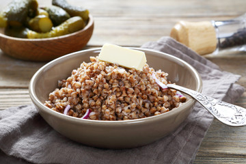 Buckwheat in a bowl on the boards