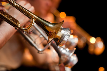 Fototapeta na wymiar Trumpet fragment in the orchestra closeup in black and white 